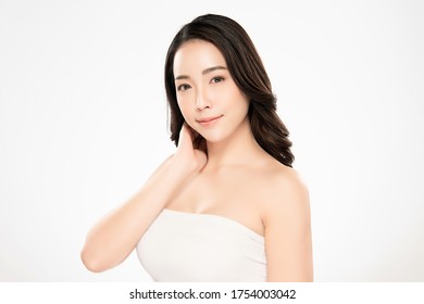 Beautiful Young Asian Woman touching her body with fresh Healthy Skin, isolated on white background, Beauty Cosmetics and Facial treatment Concept - Shutterstock ID 1754003042