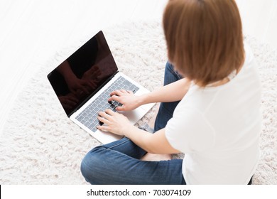 Beautiful young asian woman using laptop