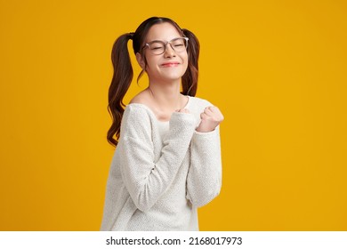 Beautiful Young Asian Women Feel Happiness With Positive Expression, Joyful On Yellow Background. Happy Adorable Glad Woman Rejoices Success. Facial Expression.