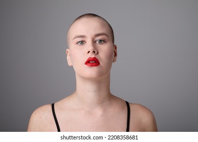 Beautiful Young Bald Woman Looking At The Camera Posing Indoor. Mock-up.