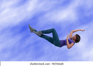A beautiful young black African American woman falling through the sky