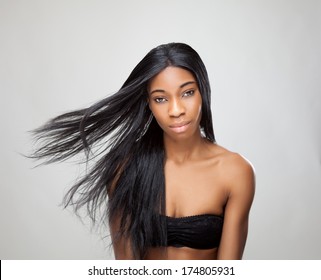 Beautiful Young Black Woman With Long Straight Hair