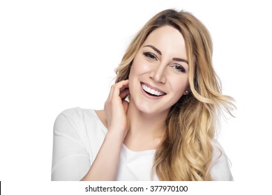 Beautiful young blond smiling woman with clean face.