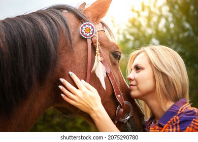 Beautiful Young Blond Woman With A Horse, Portrait. The Concept Of Love For Nature, Human Interaction With Nature And Animals.