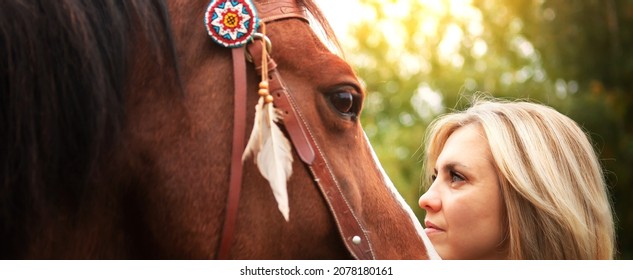 Beautiful Young Blond Woman With A Horse, Portrait. The Concept Of Love For Nature, Human Interaction With Nature And Animals.