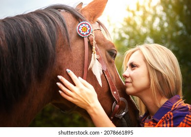 Beautiful Young Blond Woman With A Horse, Portrait. The Concept Of Love For Nature, Human Interaction With Nature And Animals.