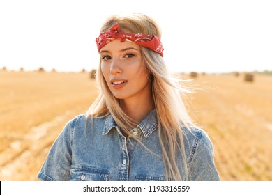 Beautiful Young Blonde Girl In Headband At The Wheat Field