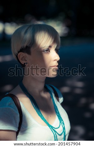 Similar – Image, Stock Photo Young woman with turquoise hair and piercings smiles