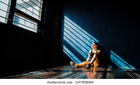 beautiful young boxing woman resting after training after punching in gym. Fit female preparing to boxing competition. Wellness, fighting, motivation, martial arts, self defense concept - Powered by Shutterstock