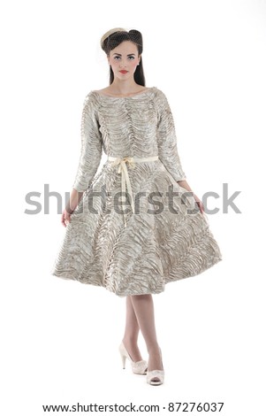 beautiful young bride wearing  wedding dress in retro fashion style isolated on white background in studio