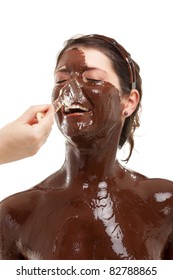 Beautiful Young Brunette Woman Having A Chocolate Face Mask