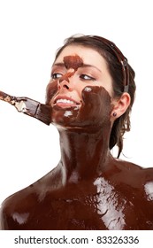 Beautiful Young Brunette Woman Having A Chocolate Face Mask