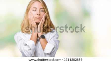 Beautiful young business woman over isolated background Tired hands covering face, depression and sadness, upset and irritated for problem