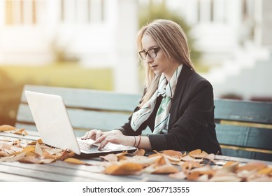 Beautiful Young Business Woman Working On Laptop Computer Outside