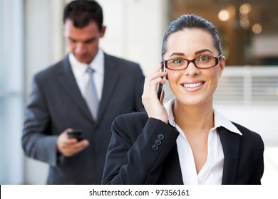 Beautiful Young Businesswoman Talking On Cell Phone