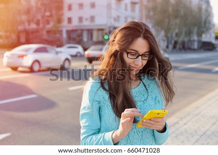 Similar – beautiful woman talking on the phone while laughing.