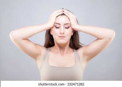 Beautiful Young Caucasian Woman Doing Face Yoga Pose