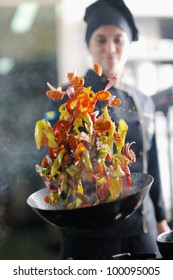 Beautiful Young Chef Woman Prepare And Decorating Tasty Food In Kitchen