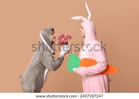 Similar – loving couple in the Park wearing pajamas