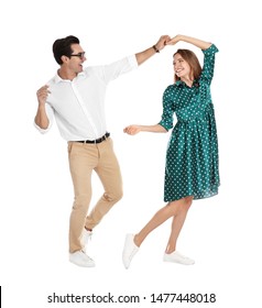 Beautiful Young Couple Dancing On White Background