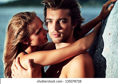 Beautiful Young Couple In Love  Having Holidays On The Sea.