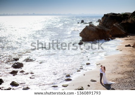 Similar – Image, Stock Photo Couple looking at the sea