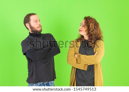 Similar – Young couple posing with funny faces