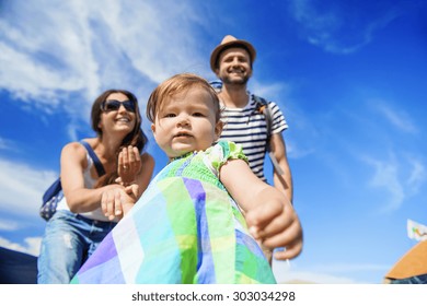 Beautiful Young Family At Summer Music Festival  