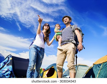 Beautiful Young Family At Summer Music Festival  