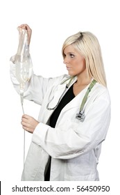 A Beautiful Young Female Doctor Holding An IV Bag