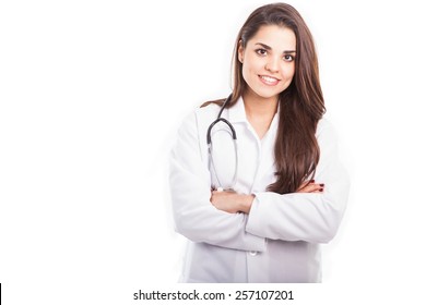 Beautiful Young Female Doctor In A Lab Coat And A Stethoscope With Plenty Of Copy Space And A White Background