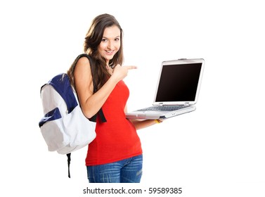 Beautiful Young Female Student Showing Something On A Laptop, Isolated On White