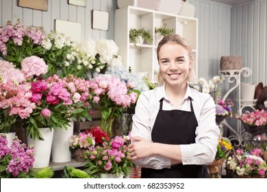 Beautiful Young Florist In Flower Shop