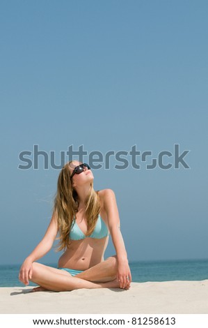 Similar – Young, slim woman on the beach of the Baltic Sea in summer wind