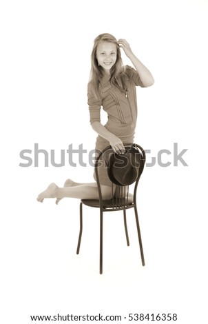 Similar – Woman in an armchair