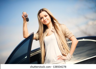 Beautiful Young Girl With Car Key In Hand