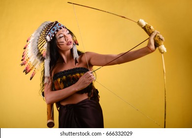 Beautiful Young Girl In Costume Native American Indian Woman On Studio Background