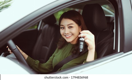 Beautiful Young Girl Driver With Car Key In Hand, Happy Owner Of A New Automobile