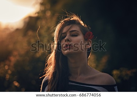 Similar – Young redhead woman listening to music