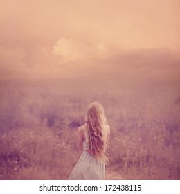 Beautiful Young Girl In A Field