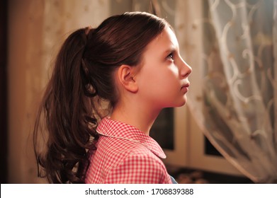 Beautiful Young Girl With Hairdo Tail In Profile