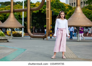 Beautiful Young Girl At The Jairo Varela Square In The City Of Cali In Colombia