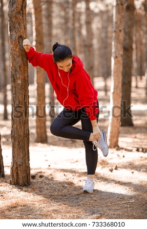 Similar – Image, Stock Photo Young man exercising outdoors in a forest