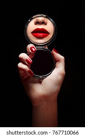 A Beautiful Young Girl Looks In The Mirror And Sees A Reflection Of Red Lips.