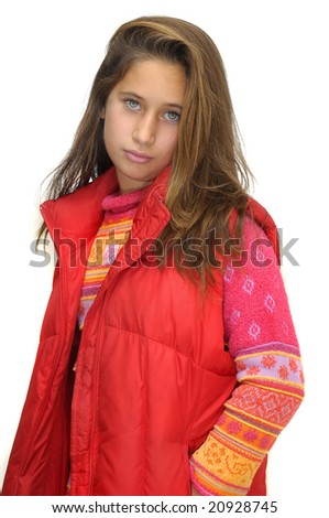 Beautiful young girl posing against a white background