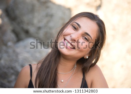 Similar – Portrait of a beautiful young woman outdoor smiling