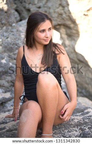 beautiful young girl posing on a sunny day