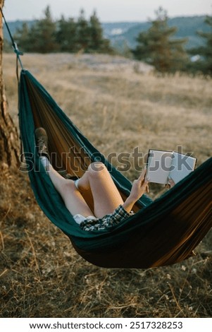 Similar – Foto Bild Young woman relaxing in a hammok