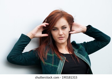 Beautiful young girl with red hair