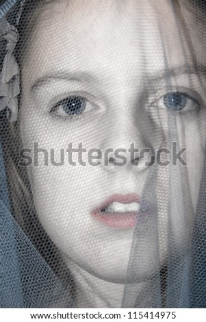 Similar – Abstract portrait of a young woman looking at camera